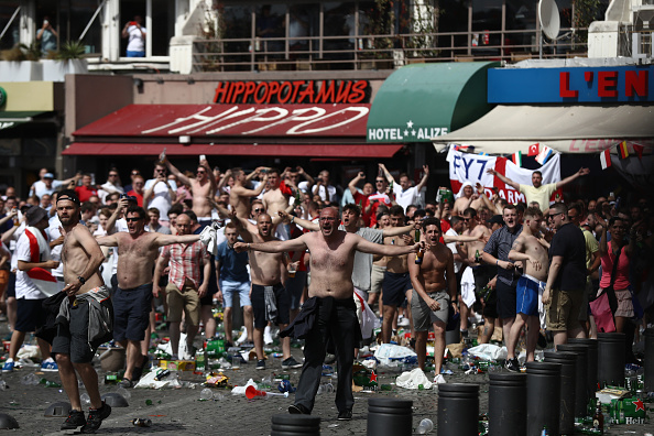 MARSEILLE, FRANCE - JUNE 11: Rubbish lines the streets as England fans gather, cheer and clash with police ahead of the game against Russia later today on June 11, 2016 in Marseille, France. Football fans from around Europe have descended on France for the UEFA Euro 2016 football tournament. (Photo by Carl Court/Getty Images)