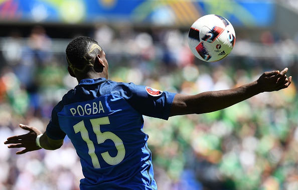 TOPSHOT - France's midfielder Paul Pogba plays the ball during the Euro 2016 round of 16 football match between France and Republic of Ireland at the Parc Olympique Lyonnais stadium in Décines-Charpieu, near Lyon, on June 26, 2016. / AFP / FRANCK FIFE (Photo credit should read FRANCK FIFE/AFP/Getty Images)